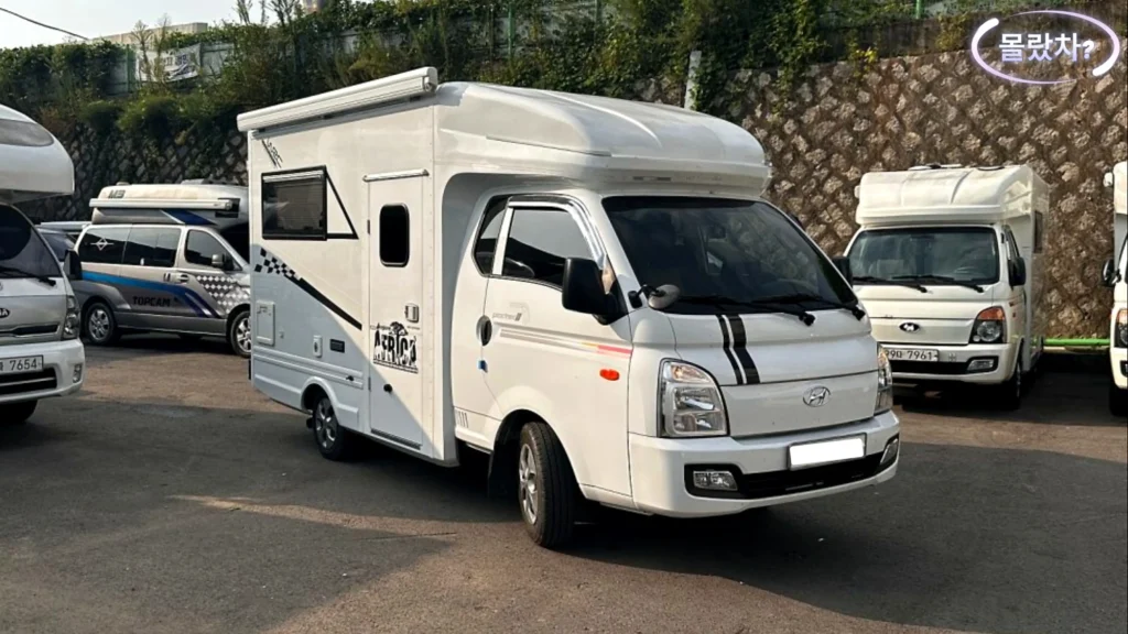 한국 캠핑카 중고 시세 포터 기반 캐브콘 캠핑카 전면 사선 뷰, 한국 중고 시장 대표 차종